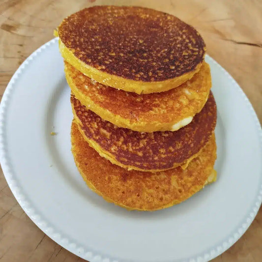 1 paquete de arepas de chocolo rellenas de queso mozzarella x4 und